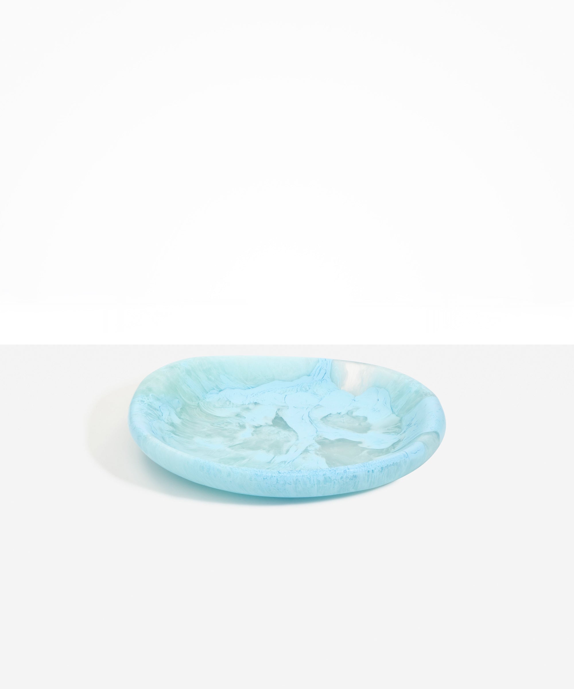 Dinosaur Designs Medium Bones Bowl in Pool — mid sized handmade marbled blue resin shallow serving bowl with a rounded organic form