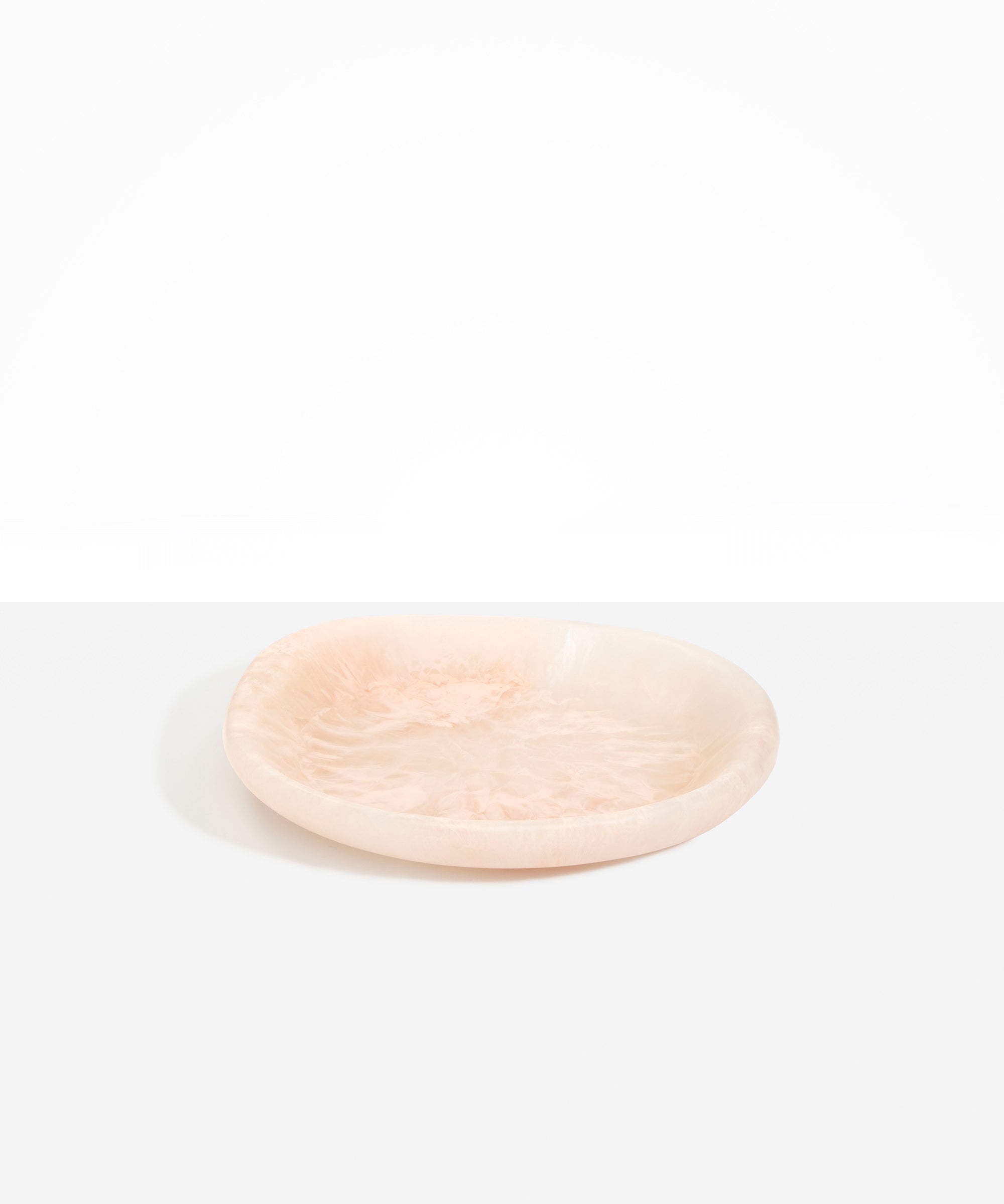 Dinosaur Designs Medium Bones Bowl in Rose Swirl — mid sized handmade pink resin shallow serving bowl with a rounded organic form...