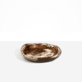 Dinosaur Designs Small Bones Bowl in Cappuccino — small handmade marbled brown and cream resin shallow serving bowl with a rounded organic form...