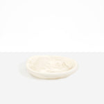 Dinosaur Designs Small Bones Bowl in Chalk Swirl — small handmade marbled off-white resin shallow serving bowl with a rounded organic form