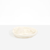 Dinosaur Designs Small Bones Bowl in Chalk Swirl — small handmade marbled off-white resin shallow serving bowl with a rounded organic form
