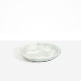Dinosaur Designs Small Bones Bowl in Cloud — small handmade marbled grey and cream resin shallow serving bowl with a rounded organic form