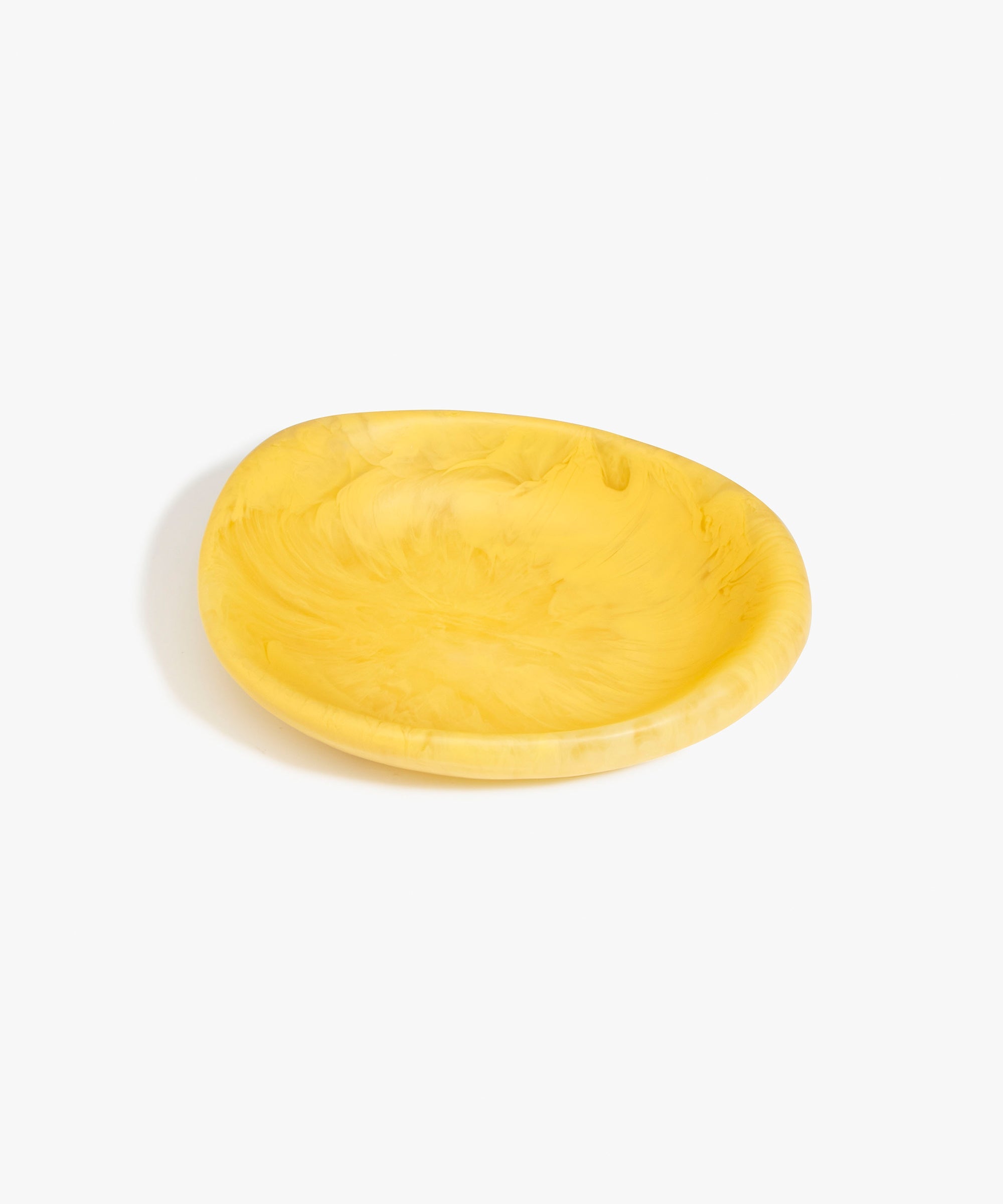 Dinosaur Designs Small Bones Bowl in Pollen — small handmade marbled yellow resin shallow serving bowl with a rounded organic form