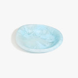 Dinosaur Designs Small Bones Bowl in Pool — small handmade marbled blue resin shallow serving bowl with a rounded organic form