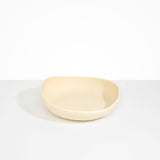 Dinosaur Designs BWLFLOMED Medium Flow Bowl in Cream colour resin.