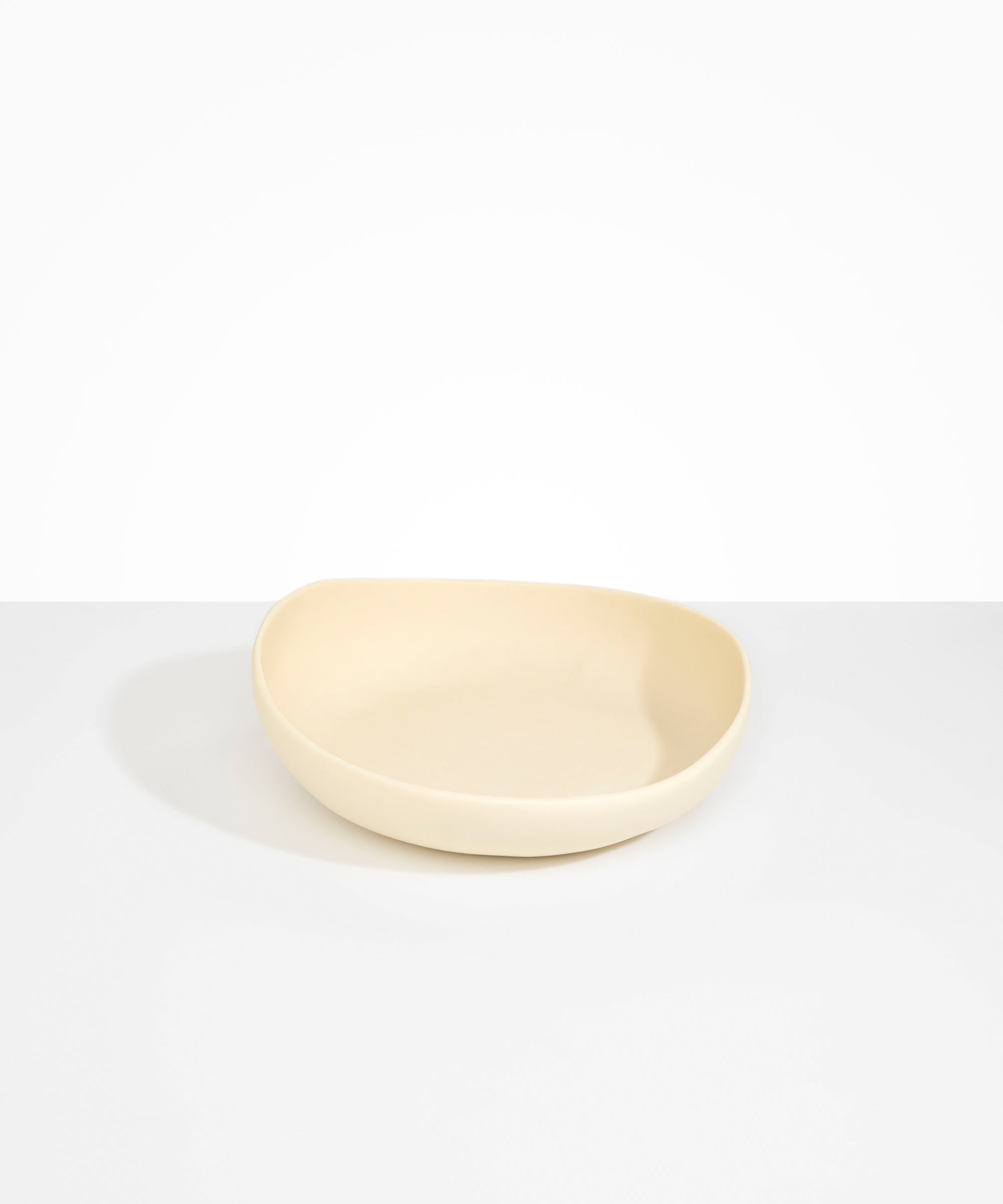 Dinosaur Designs BWLFLOMED Medium Flow Bowl in Cream colour resin.