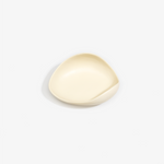 Dinosaur Designs Small Leaf Bowl in Cream — handcrafted cream resin bowl with curved organic form