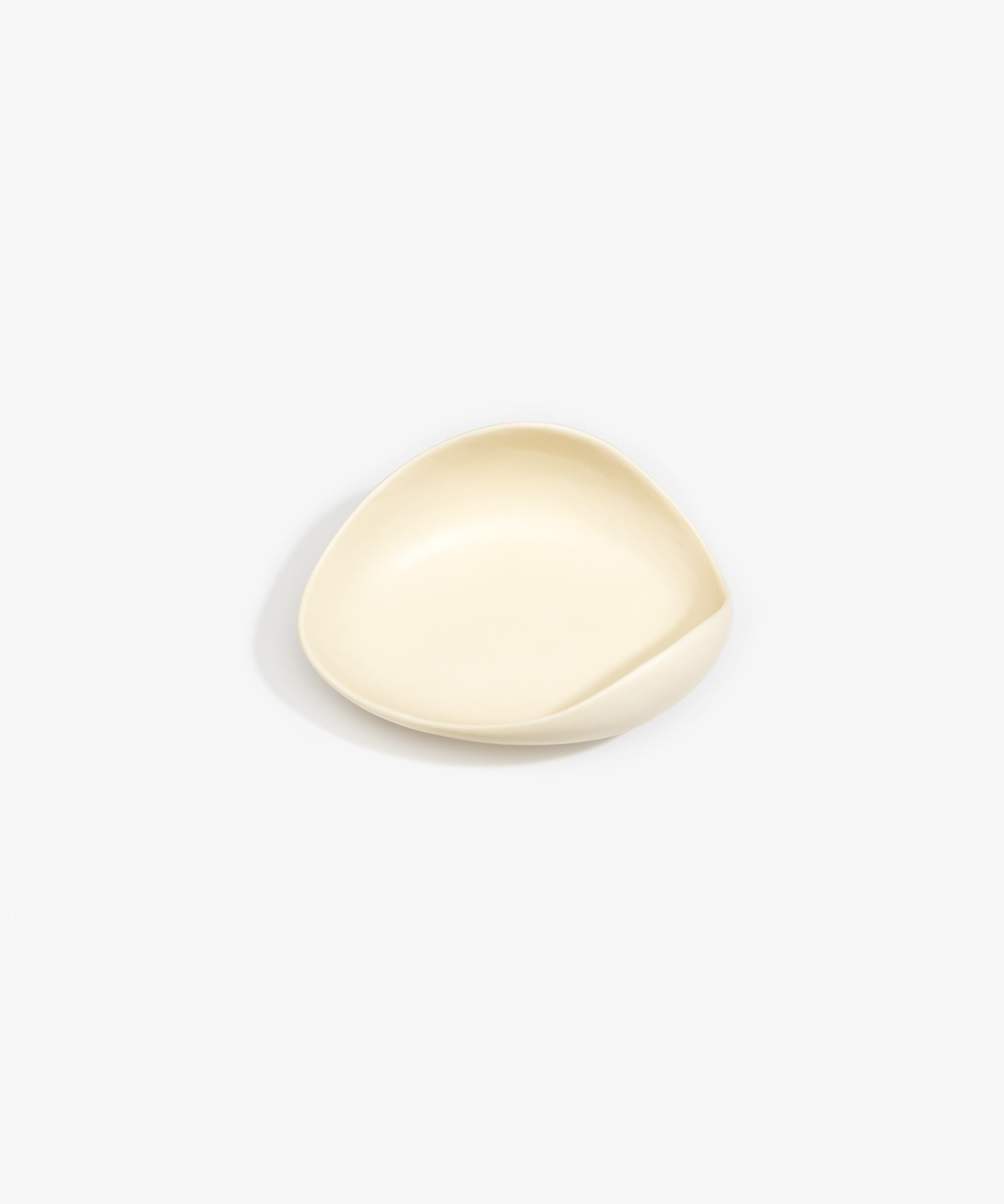 Dinosaur Designs Small Leaf Bowl in Cream — handcrafted cream resin bowl with curved organic form