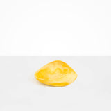 Dinosaur Designs Small Leaf Bowl in Daisy — handcrafted marbled yellow resin bowl with curved organic form