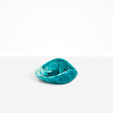 Dinosaur Designs Small Leaf Bowl in Lagoon — handcrafted marbled blue and cream resin bowl with curved organic form