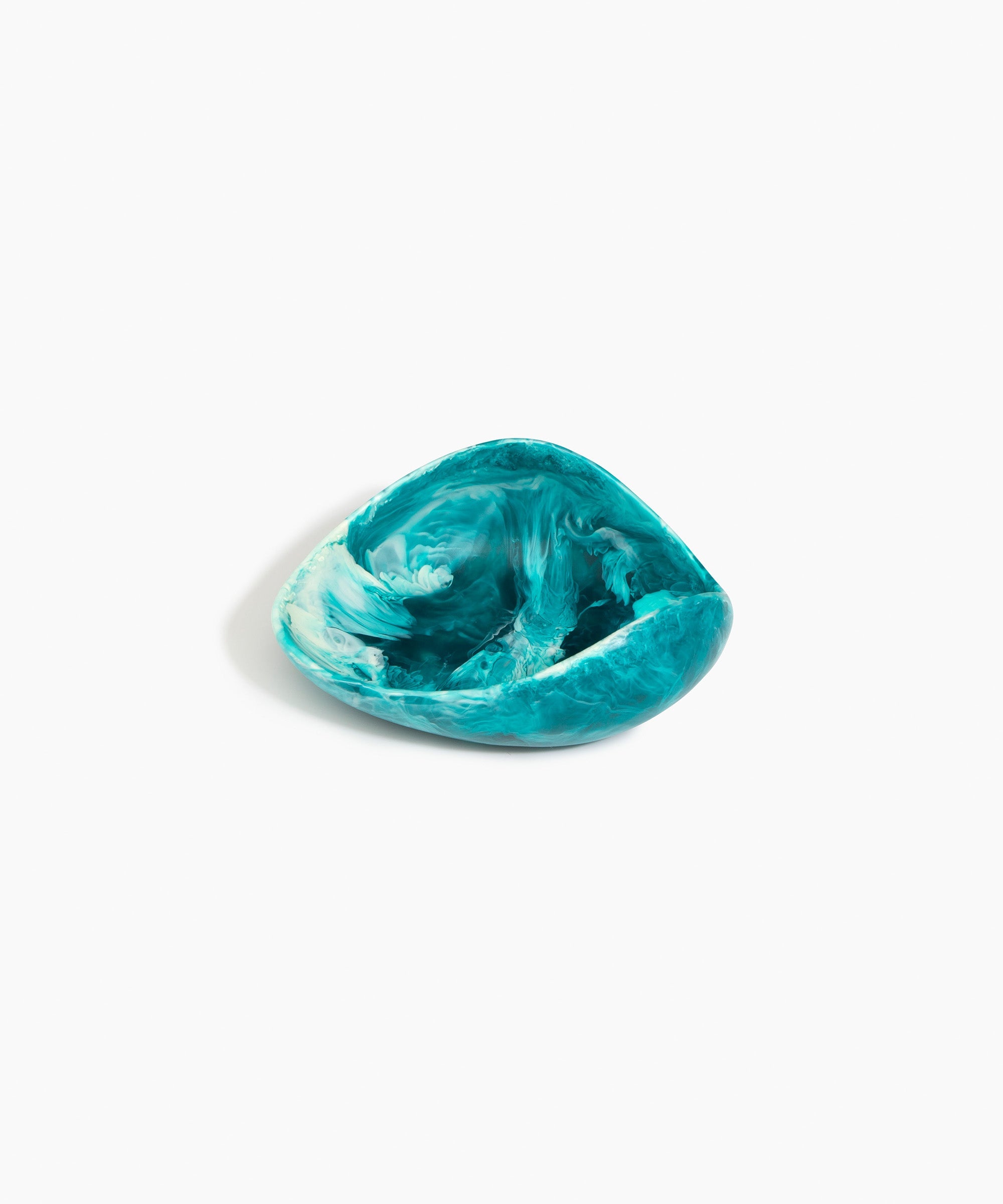 Dinosaur Designs Small Leaf Bowl in Lagoon — handcrafted marbled blue and cream resin bowl with curved organic form