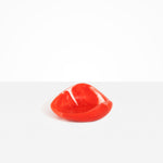 Dinosaur Designs Small Leaf Bowl in Poppy — handcrafted marbled red and transparent resin bowl with curved organic form