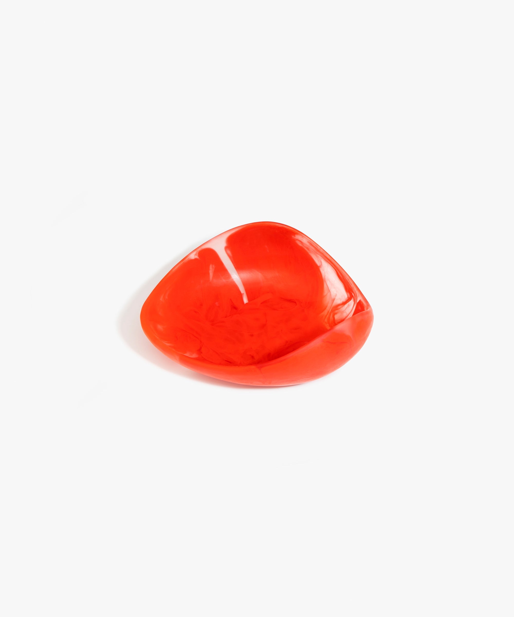 Dinosaur Designs Small Leaf Bowl in Poppy — handcrafted marbled red and transparent resin bowl with curved organic form