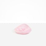 Dinosaur Designs Small Leaf Bowl in Shell Pink — handcrafted marbled pink resin bowl with curved organic form.