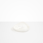 Dinosaur Designs Small Leaf Bowl in Snow Swirl — handcrafted white and transparent resin bowl with curved organic form