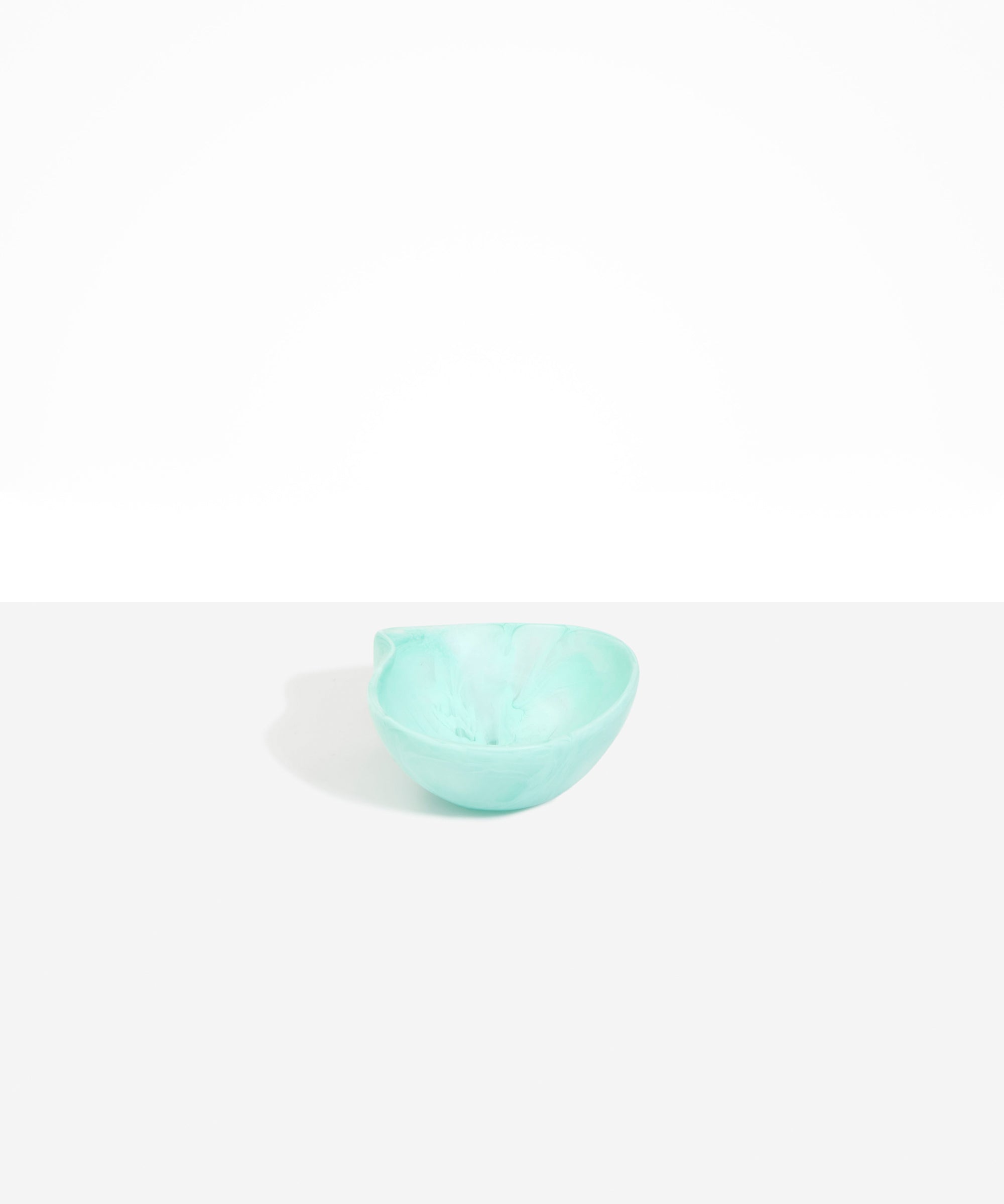 Dinosaur Designs Petal Dessert Bowl in Mint — handcrafted marbled mint blue resin bowl with curved form and pinched organic rim