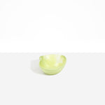 Dinosaur Designs Petal Dessert Bowl in Pistachio — handcrafted marbled pastel green resin bowl with curved form and pinched organic rim