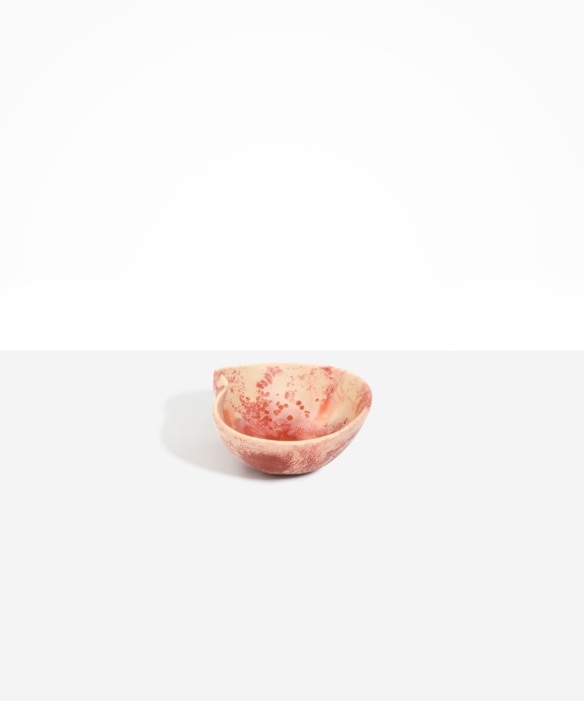 Dinosaur Designs Petal Dessert Bowl in Rust — handcrafted marbled terracotta red and cream resin bowl with curved form and pinched organic rim
