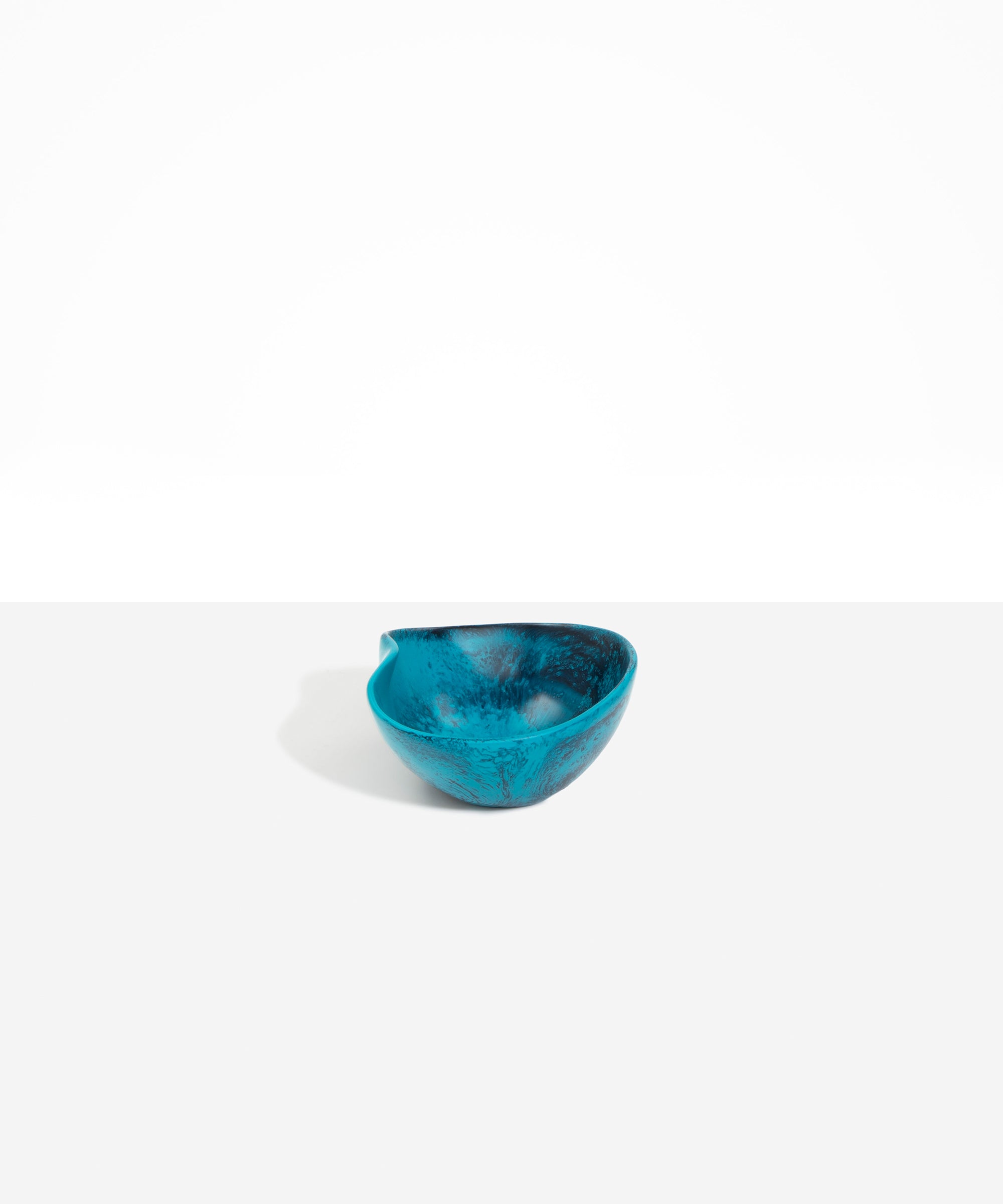 Dinosaur Designs Petal Dessert Bowl in Turquoise — handcrafted marbled teal blue resin bowl with curved form and pinched organic rim