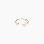 Dinosaur Designs Polished Lotus Cuff in Chalk Swirl with Brass — open brass cuff bracelet with asymmetric marbled off-white resin and polished brass teardrop