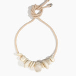 Dinosaur Designs Drift Choker in Chalk Swirl with Plated-Silver — marbled off-white resin pebble beads on a wood silk cord with silver-plated end cap