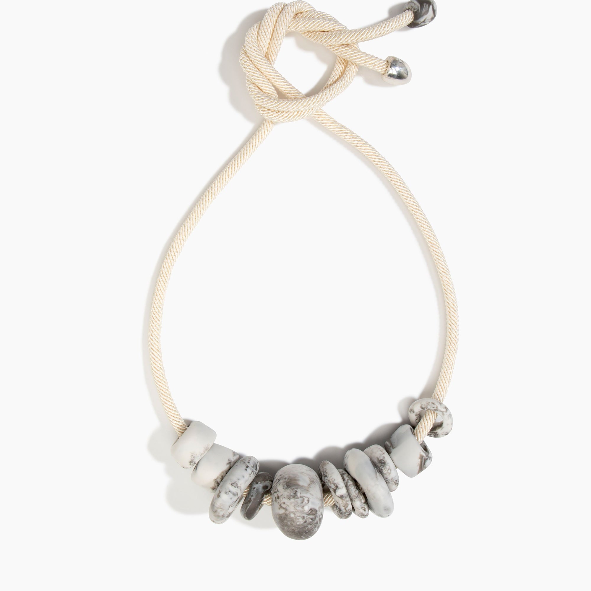 Dinosaur Designs Drift Choker in Granite with Plated-Silver — marbled cream and grey resin pebble beads on a wood silk cord with silver-plated end cap.