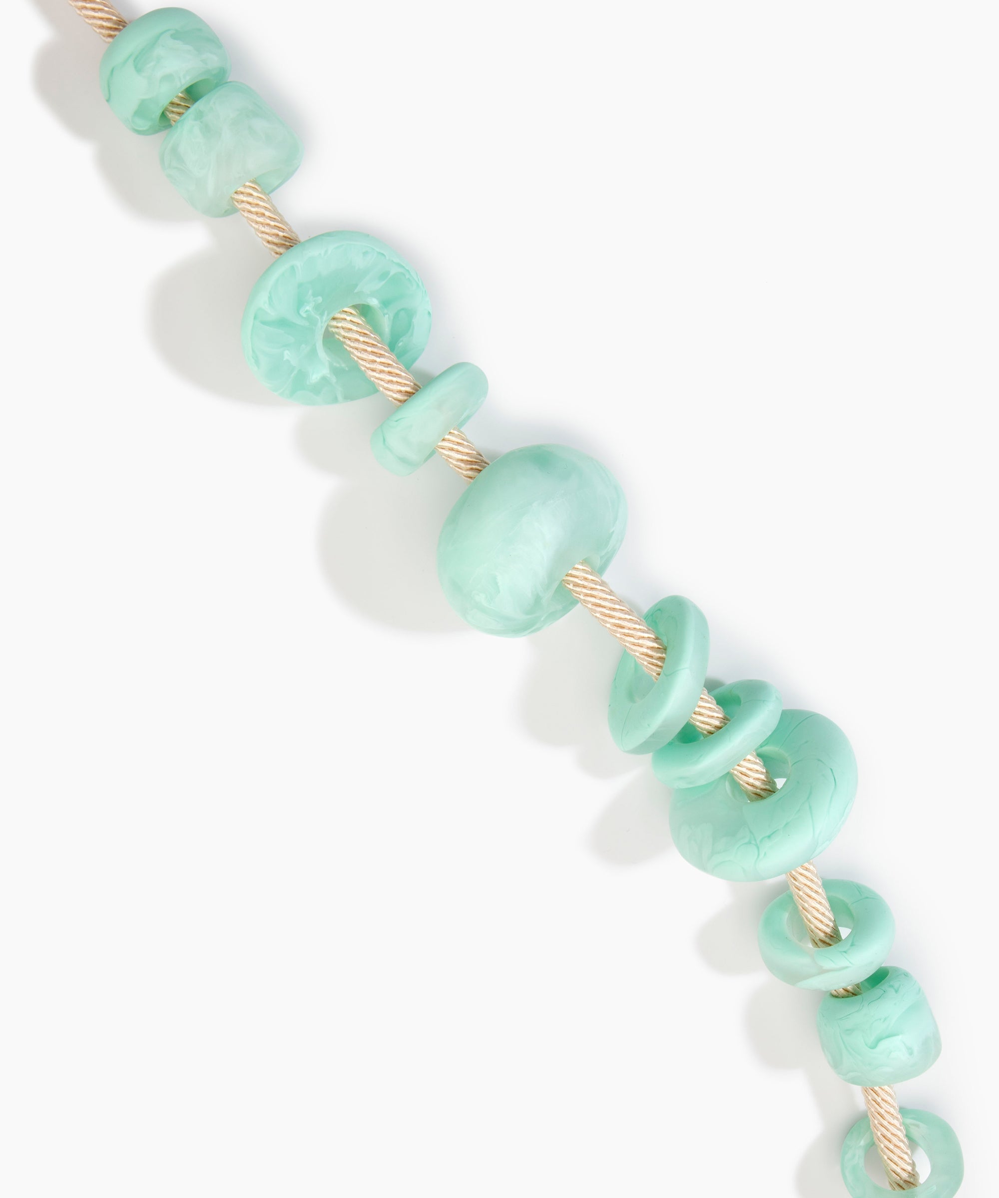 Dinosaur Designs Drift Choker in Mint with Plated-Silver — marbled blue green resin pebble beads on a wood silk cord with silver-plated end cap
