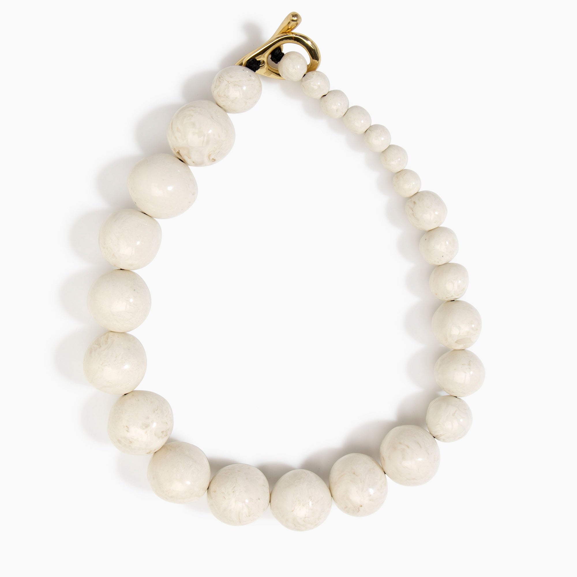 Dinosaur Designs Polished Organic Ball Choker in Chalk Swirl — handcrafted marbled off-white and clear polished resin graduating bead choker necklace with brass t-bar clasp
