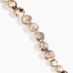 Dinosaur Designs Polished Organic Ball Choker in Cappuccino — handcrafted marbled cream and brown polished resin graduating bead choker necklace with brass t-bar clasp.