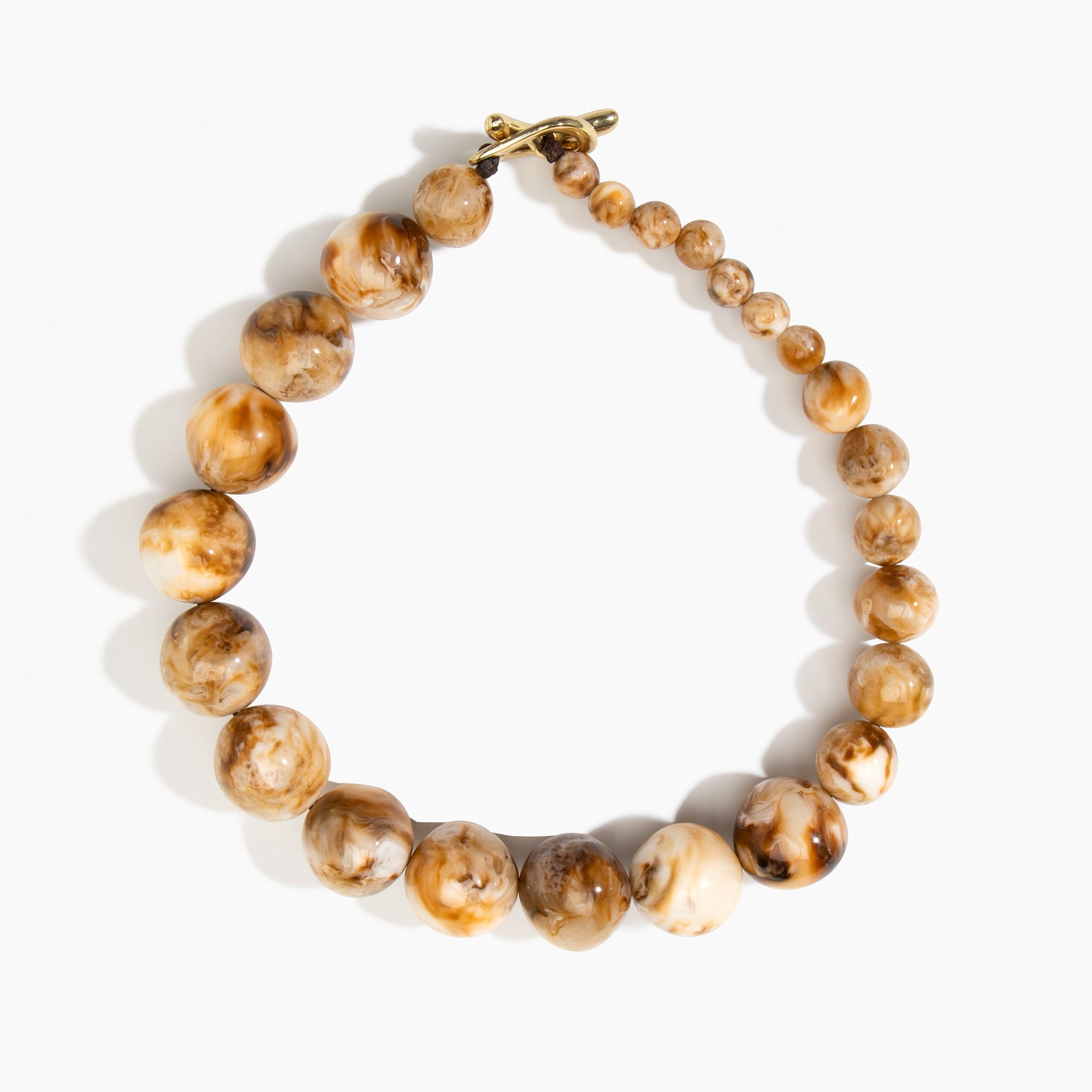 Dinosaur Designs Polished Organic Ball Choker in Light Horn — handcrafted marbled cream and brown polished resin graduating bead choker necklace with brass t-bar clasp...