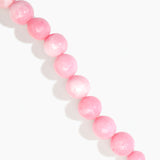 Dinosaur Designs Polished Organic Ball Choker in Shell Pink — handcrafted marbled pink polished resin graduating bead choker necklace with brass t-bar clasp.