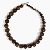 Dinosaur Designs Polished Organic Ball Necklace in Cocoa — handcrafted marbled brown and transparent polished resin graduating bead necklace with silver t-bar clasp.