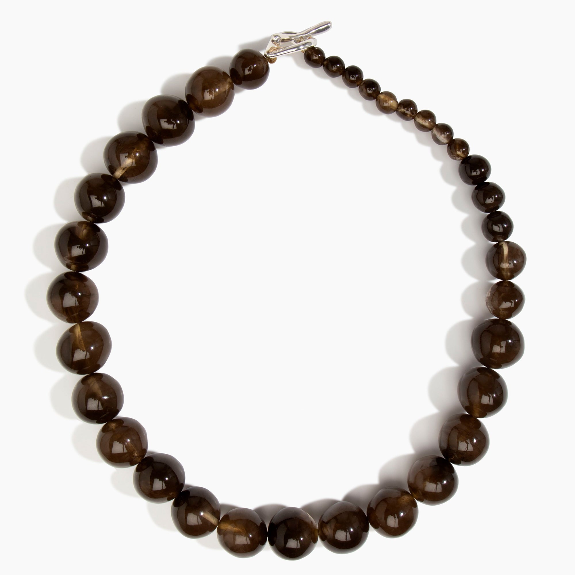 Dinosaur Designs Polished Organic Ball Necklace in Cocoa — handcrafted marbled brown and transparent polished resin graduating bead necklace with silver t-bar clasp...