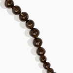 Dinosaur Designs Polished Organic Ball Necklace in Cocoa — handcrafted marbled brown and transparent polished resin graduating bead necklace with silver t-bar clasp.