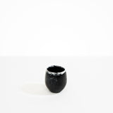 Dinosaur Designs Large Rock Cup in Black Marble — handcrafted marbled black and white resin cup with rounded bulbous form and open organic rim..