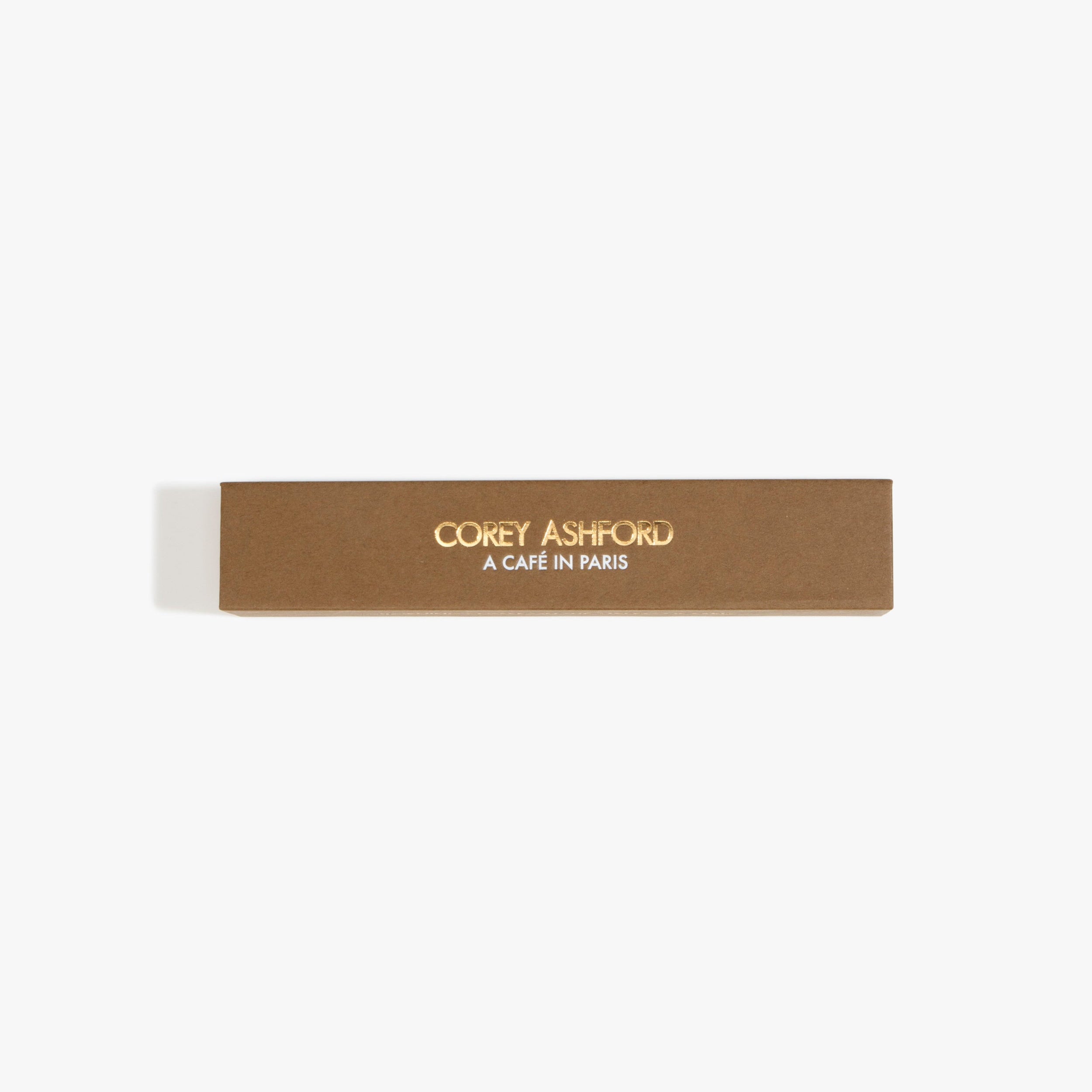 Dinosaur Designs Corey Ashford Café in Paris Japanese Incense — brown box of coffee, burnt sugar and tobacco scented incense sticks.
