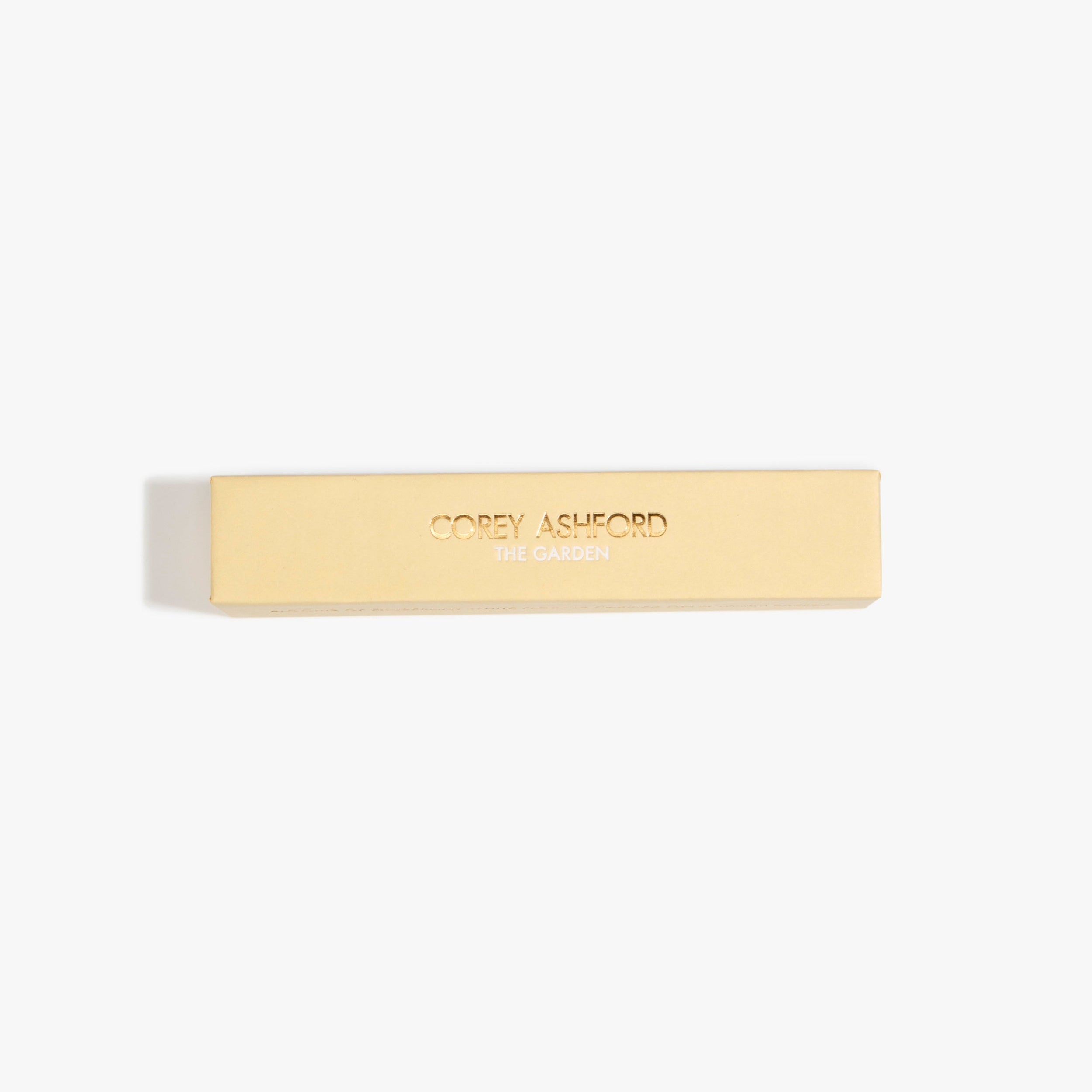 Dinosaur Designs Corey Ashford The Garden Japanese Incense — cream box of gardenia, blond woods, soil and green leaves scented incense sticks.