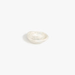 Dinosaur Designs Bones Dish in Chalk Swirl — small handcrafted marbled off-white resin trinket dish with organic form