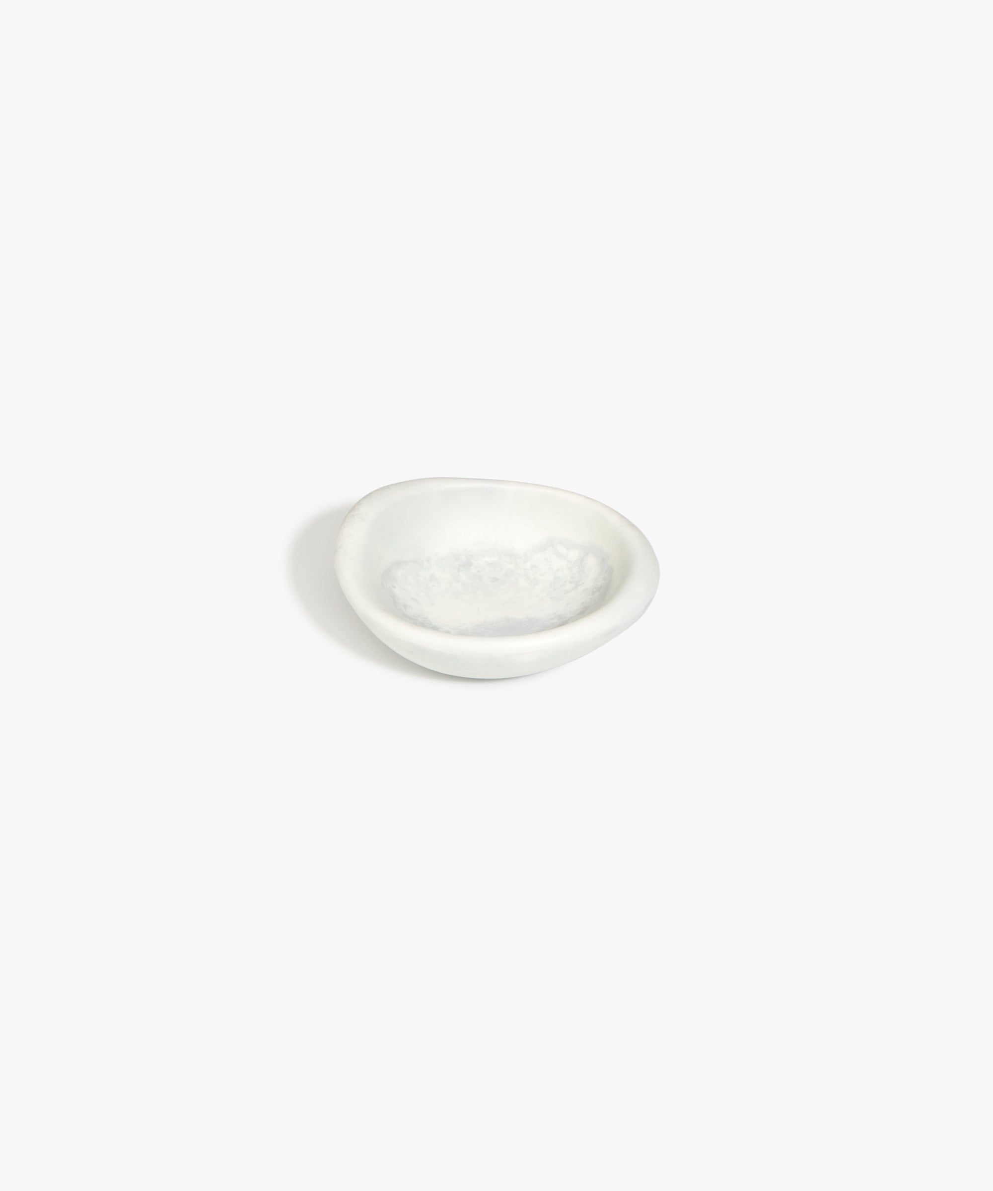 Dinosaur Designs Bones Dish in Cloud — small handcrafted grey and cream marbled resin trinket dish with organic form...