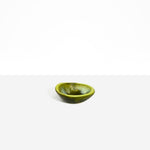 Dinosaur Designs Bones Dish in Malachite — small handcrafted marbled green and blue resin trinket dish with organic form