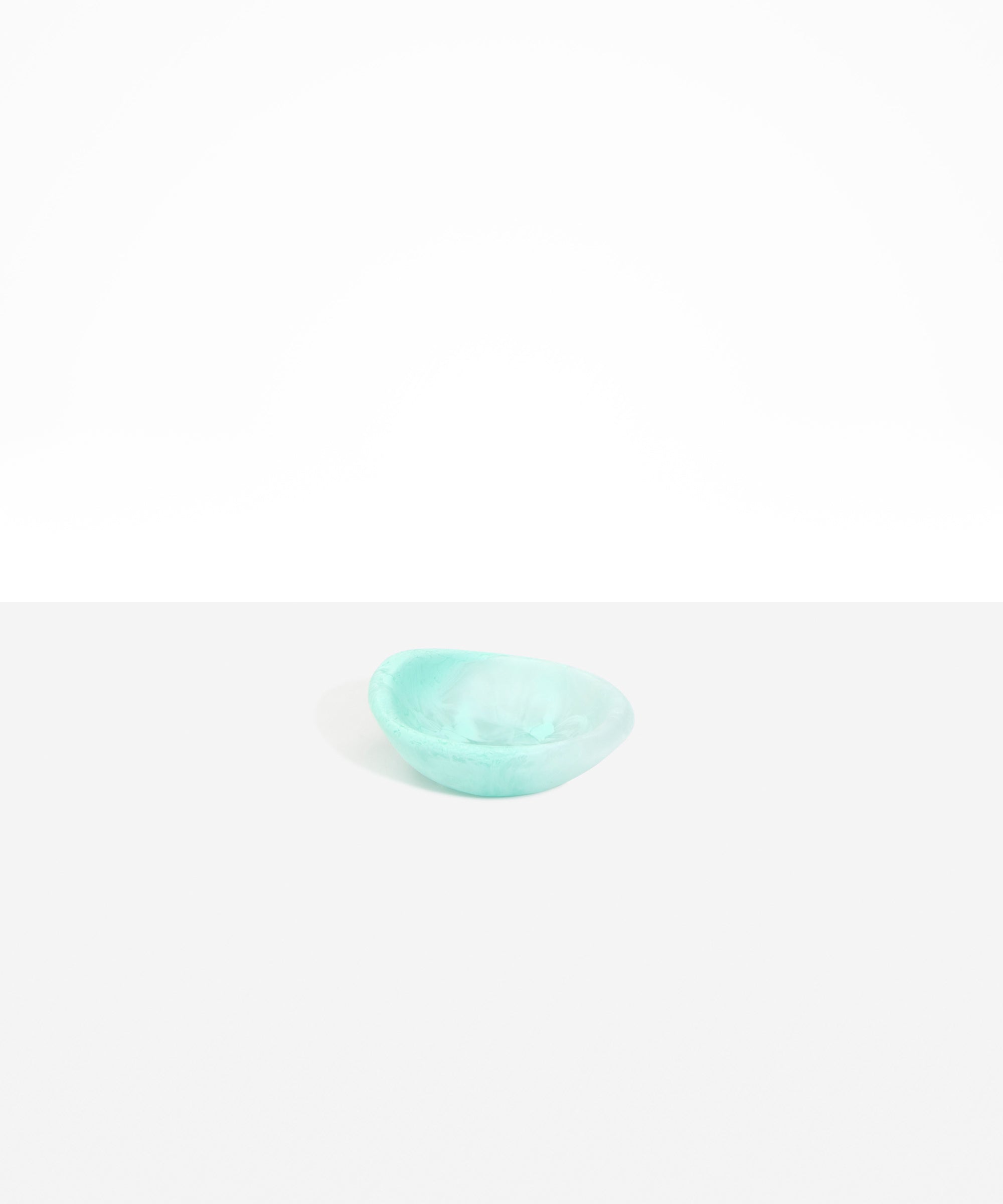 Dinosaur Designs Bones Dish in Mint — small handcrafted marbled green blue resin trinket dish with organic form