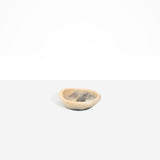 Dinosaur Designs Bones Dish in Sandy Pearl — small handcrafted marbled beige, grey and pearlescent resin trinket dish with organic form