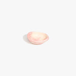 Dinosaur Designs Bones Dish in Blossom — small handcrafted marbled pink and cream resin trinket dish with organic form