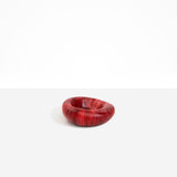 Dinosaur Designs Drift Dish in Cranberry— handcrafted marbled red resin chunky trinket dish with organic form