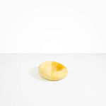 Dinosaur Designs Drift Dish in Daisy— handcrafted marbled light and dark yellow resin chunky trinket dish with organic form