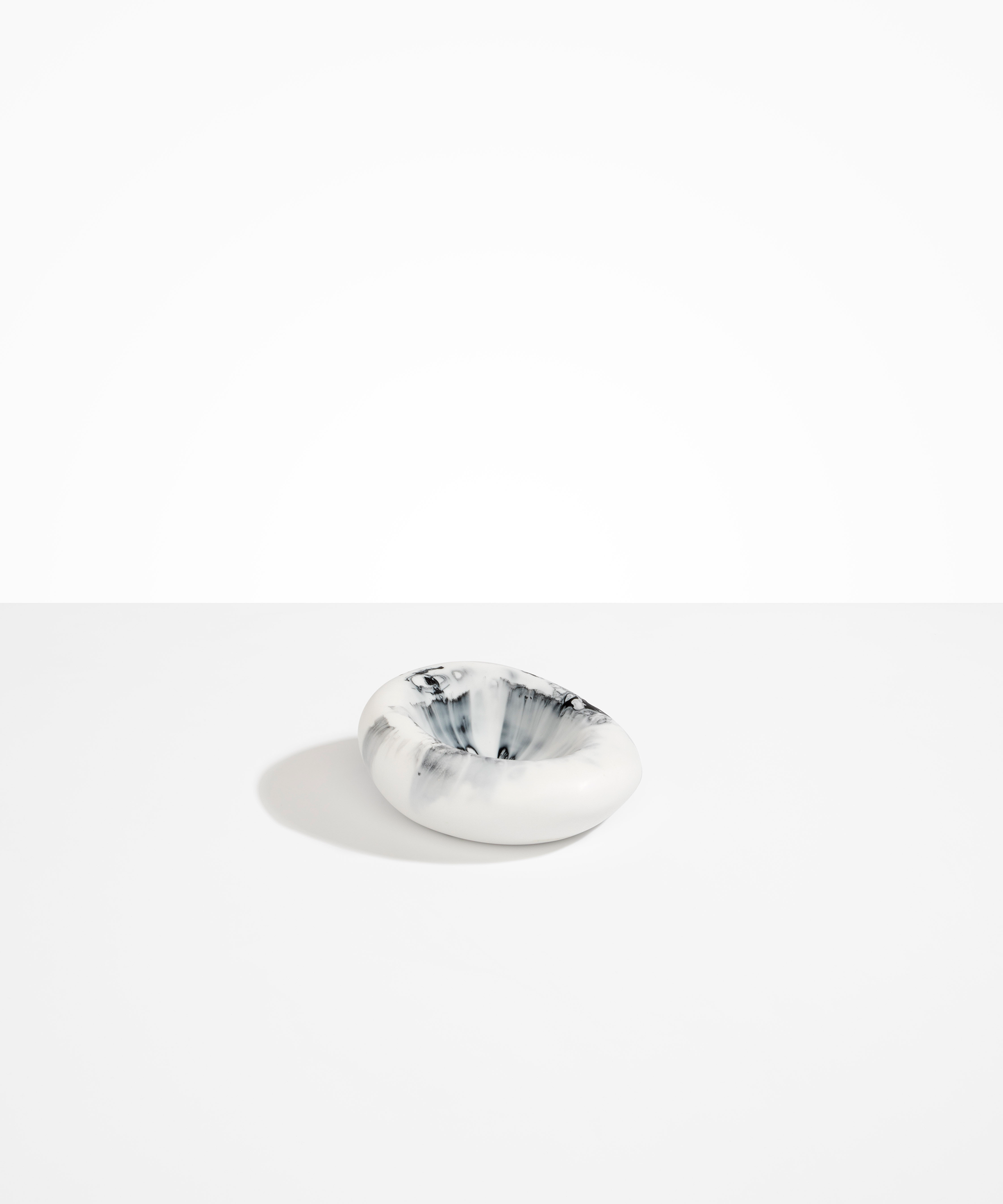Dinosaur Designs Drift Dish in Moss— handcrafted marbled green resin chunky trinket dish with organic form.