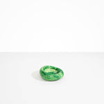 Dinosaur Designs Medium Drift Dish in Grass— handcrafted marbled light and dark green resin chunky trinket dish with organic form