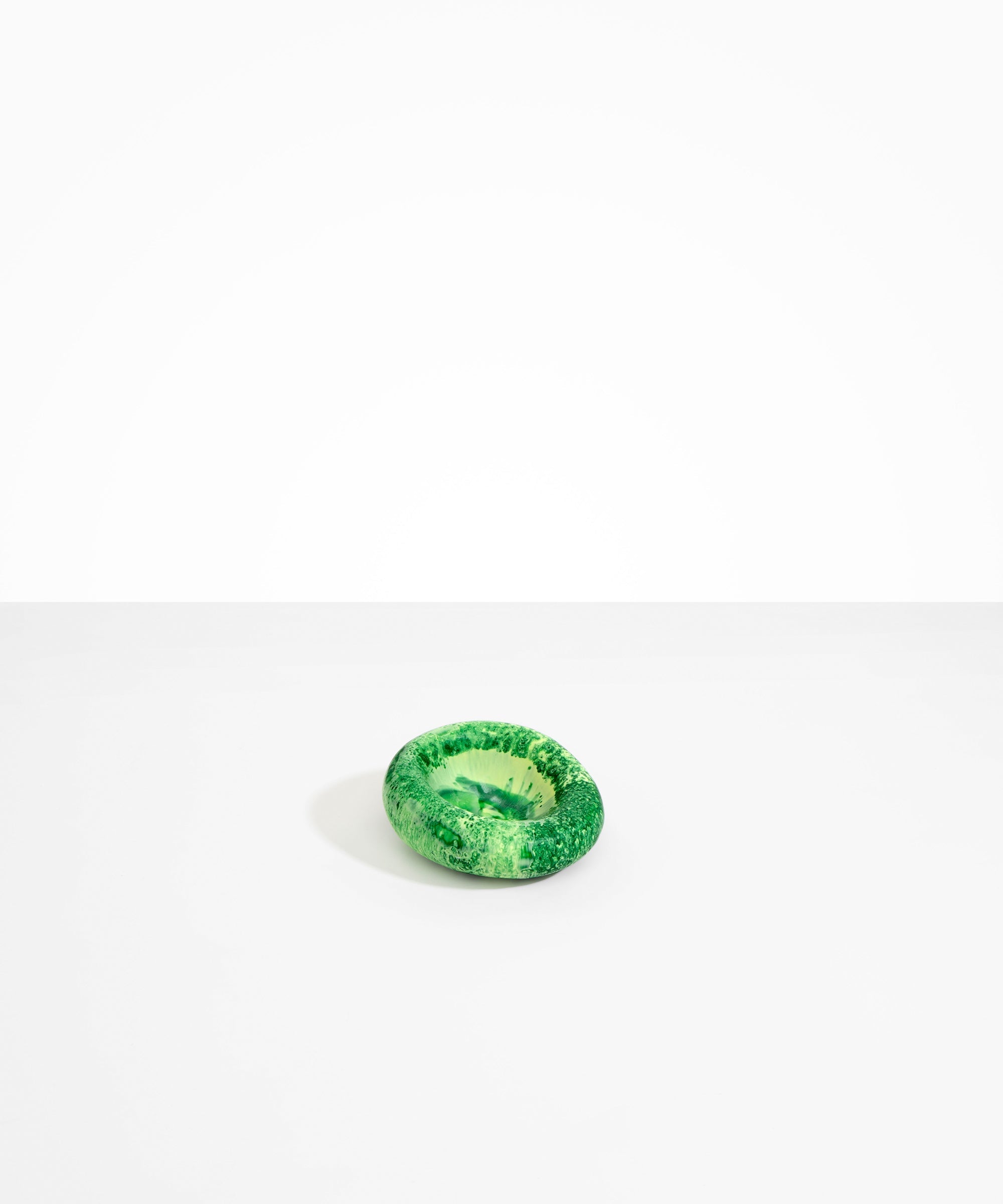 Dinosaur Designs Medium Drift Dish in Grass— handcrafted marbled light and dark green resin chunky trinket dish with organic form