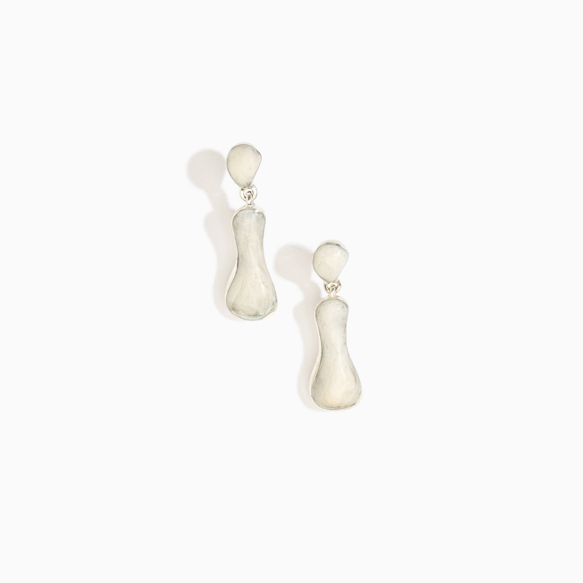 Dinosaur Designs Medium Bones Earrings in Chalk Swirl Colour resin with Silver-Plated Brass Material.