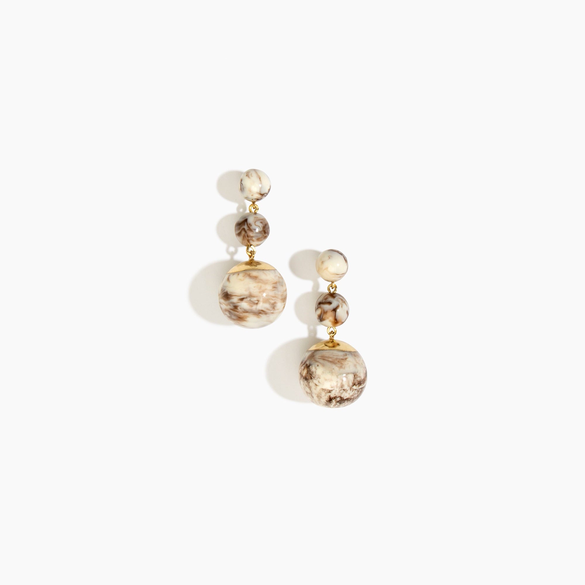 Dinosaur Designs Full Moon Drop Earrings in Cappuccino with Brass — marbled cream and brown resin graduating bead drop earrings with brass fittings..